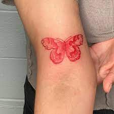 Red Butterfly Tattoo on Arm